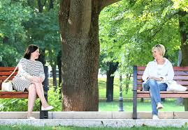 Strangers at park having a conversation