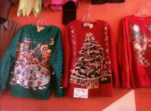 three ugly christmas sweaters