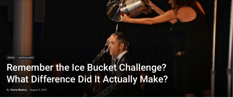 The image of a man getting a bucket of ice water dumped on his head